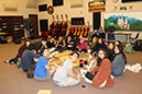 Orchestra students having pizza together
